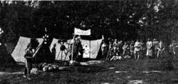 Un coin du camp à Trivaux le jour de l’inspection de M. le général Serrigny : Les tentes de la troupe Gervais (section de Vanves-Issy-Malakoff)[1]