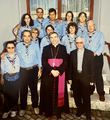 La Comunità Capi nel 2002 insieme al parroco dell'epoca, Don Franco, e a S.E.R. Don Paolo Schiavon, Vescovo ausiliare di Roma e già parroco di San Gregorio Barbarigo