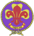 The Lebanese Syriac Scout Association emblem incorporates the Scout Motto 'ܗܵܡܝܼܫܵܐ ܗܵܐܙܹܪ